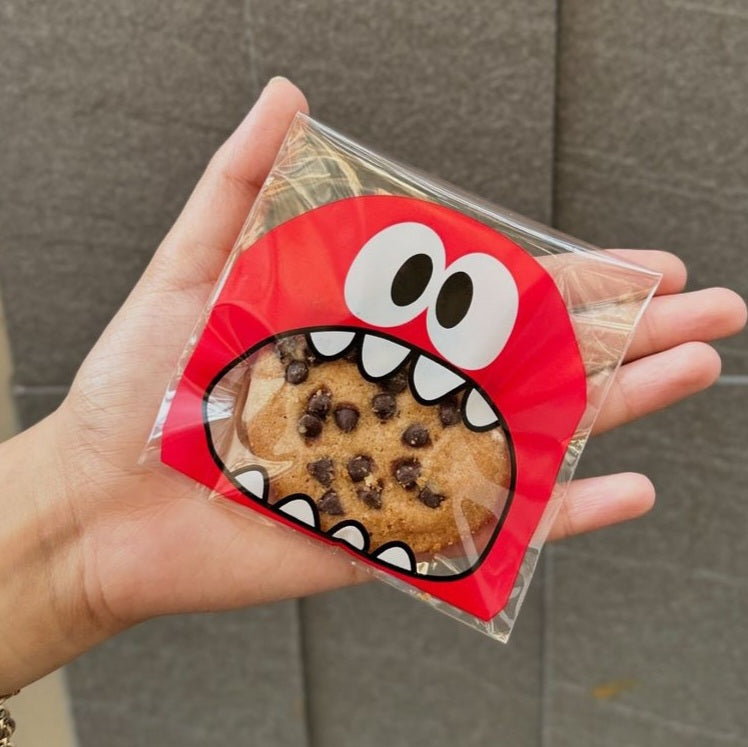 M929 Transparent Self Adhesive Cookie Monster Cookie | Brownie | Chocolate Pouches 100 Pieces Pack | Random Color